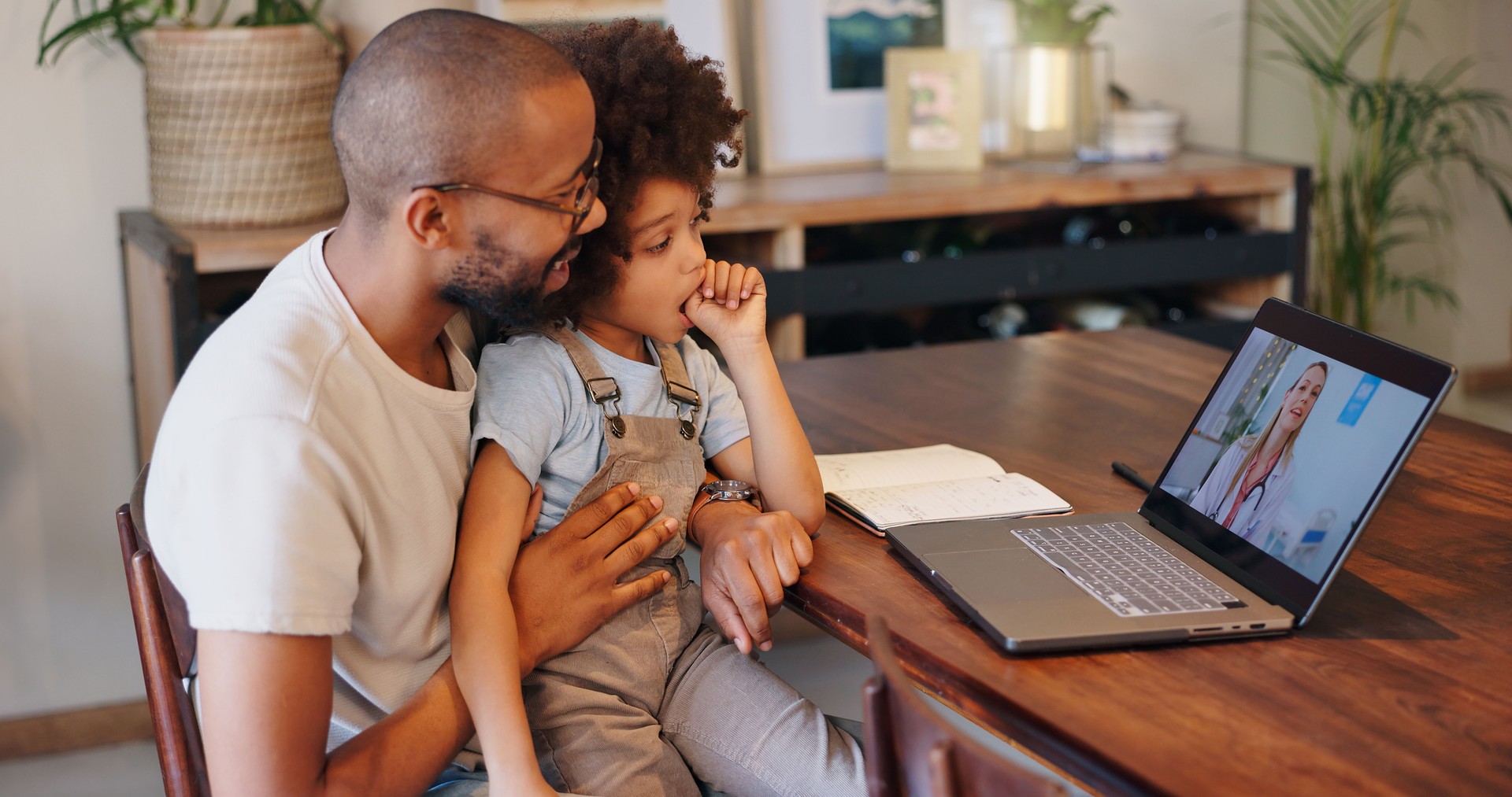 Child, black man and laptop screen with doctor for telehealth service, communication and advice. Home, boy and father with pediatrician on tech for medical support, discussion or virtual consultation